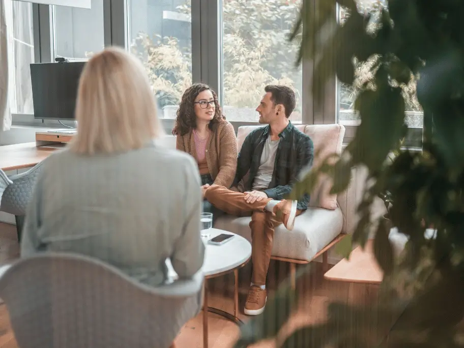 Couple rebuilding trust after lying with support from therapist